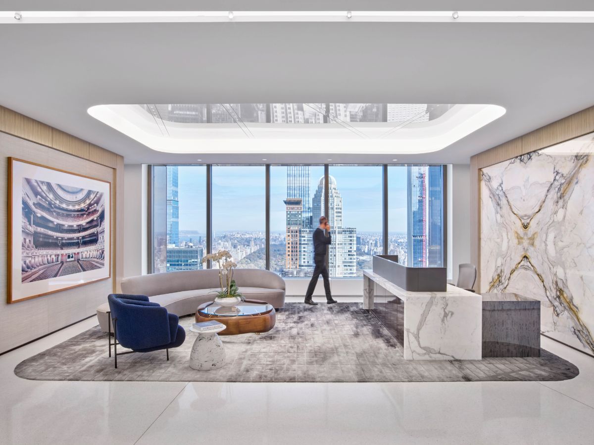 Man paces in lavish executive office overlooking Central Park